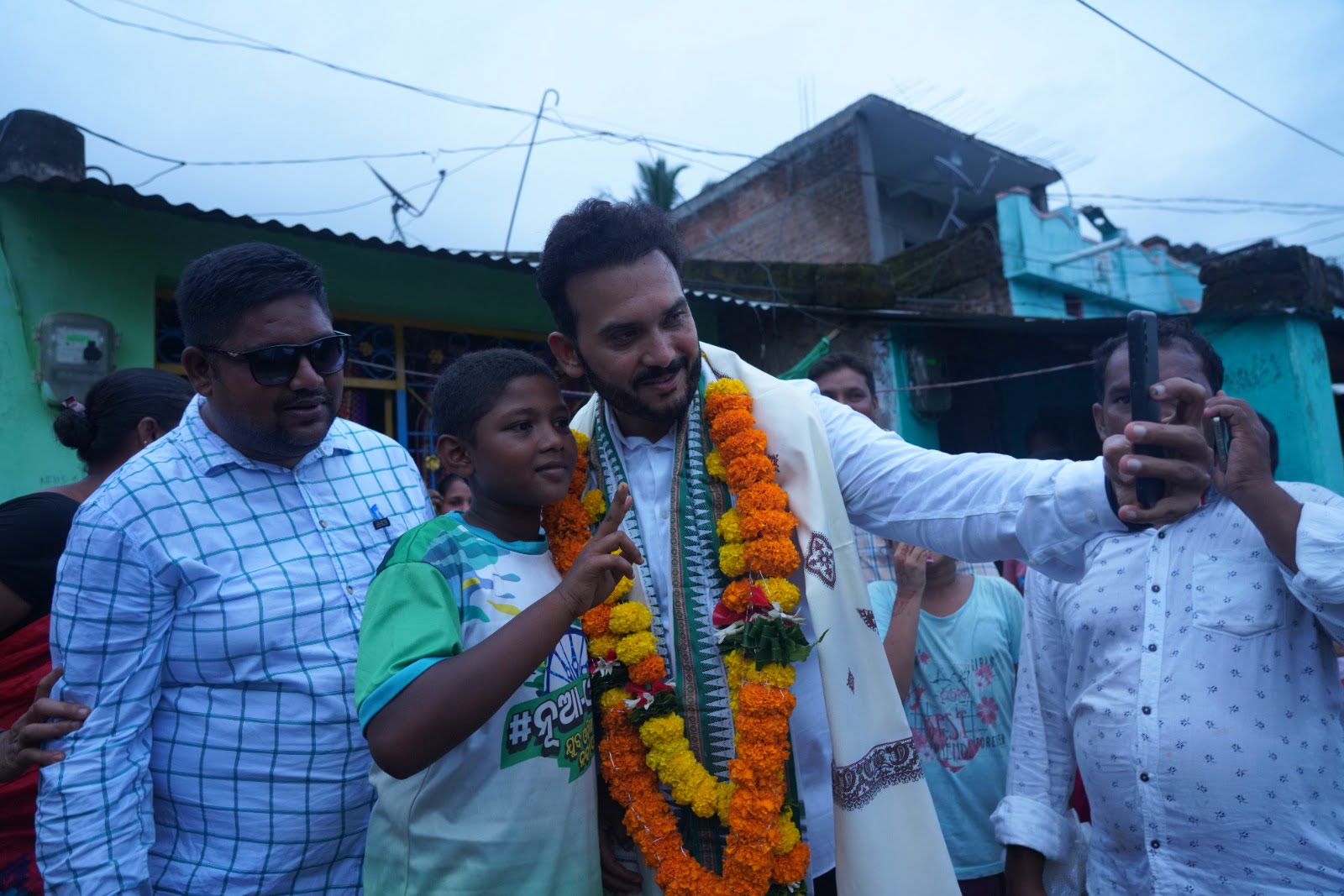 MLA Rupesh Panigrahi Taking Selfie with a little boy